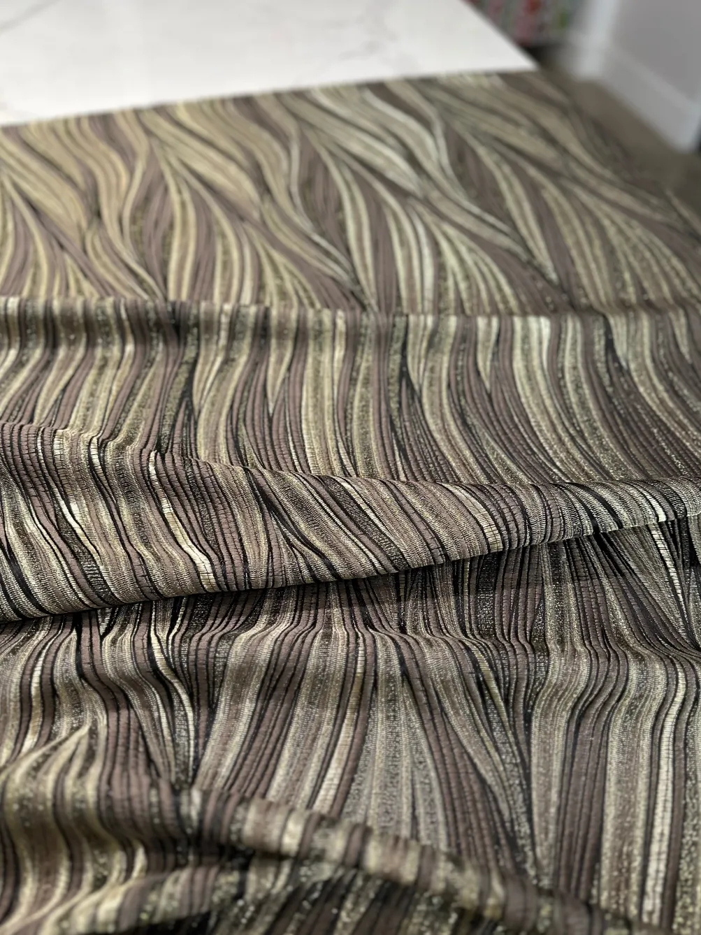 Allure Jacquard Table Linen in Taupe