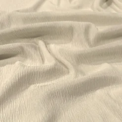 Bella Crepe Table Linen in Bone