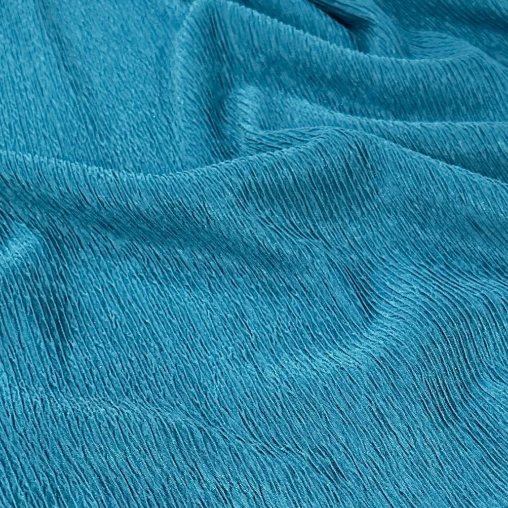 Bella Crepe Table Linen in Turquoise