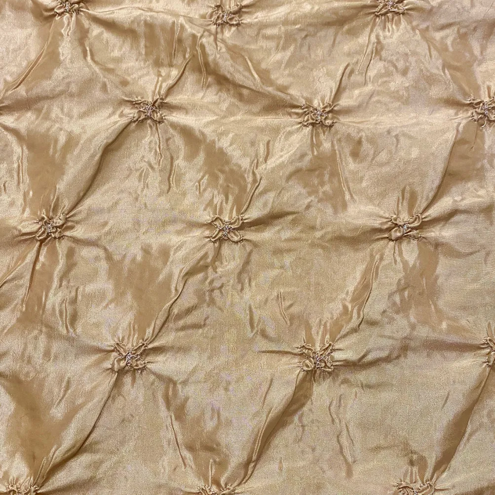 Belly Button (Pinwheel) Table Linen in Gold