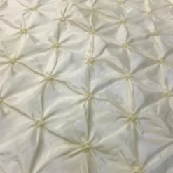 Belly Button (Pinwheel) Table Linen in Ivory