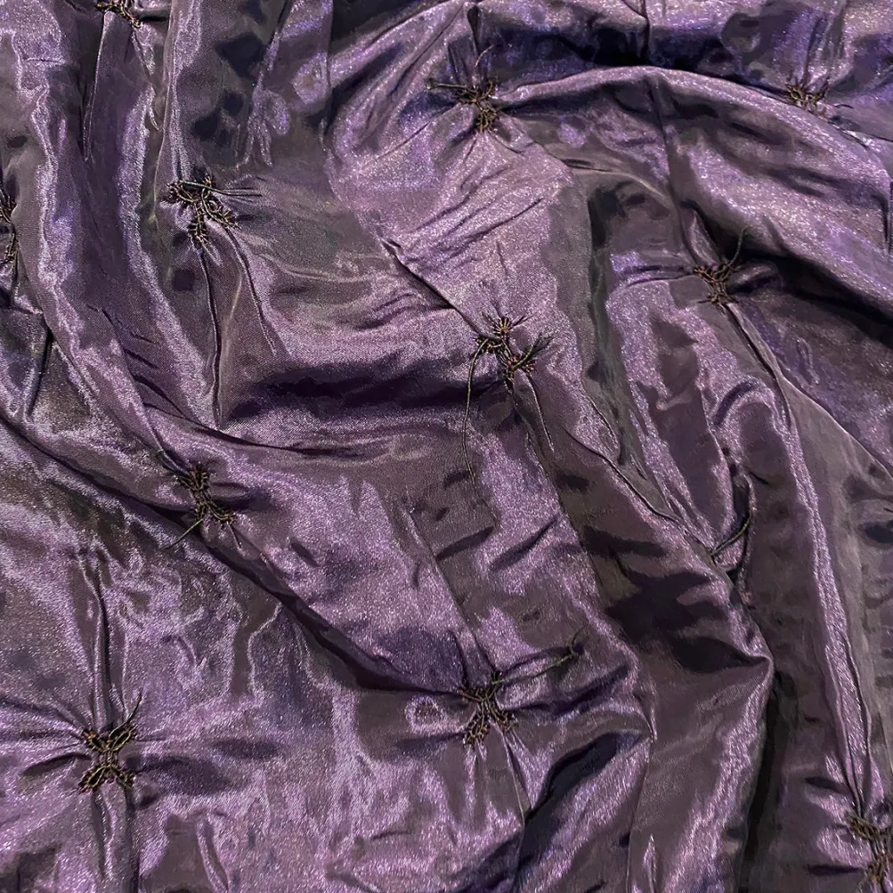 Belly Button (Pinwheel) Table Linen in Raisin