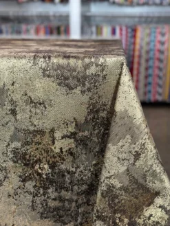 Cascade Jacquard Table Linen in Brown and Gold