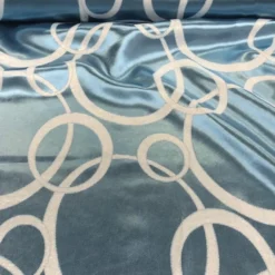 Cirque Jacquard (Reversible) Table Linen in Turquoise