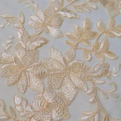 Claire Lace Table Linen in Champagne