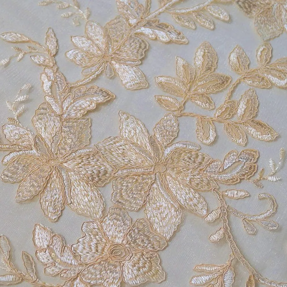 Claire Lace Table Linen in Champagne