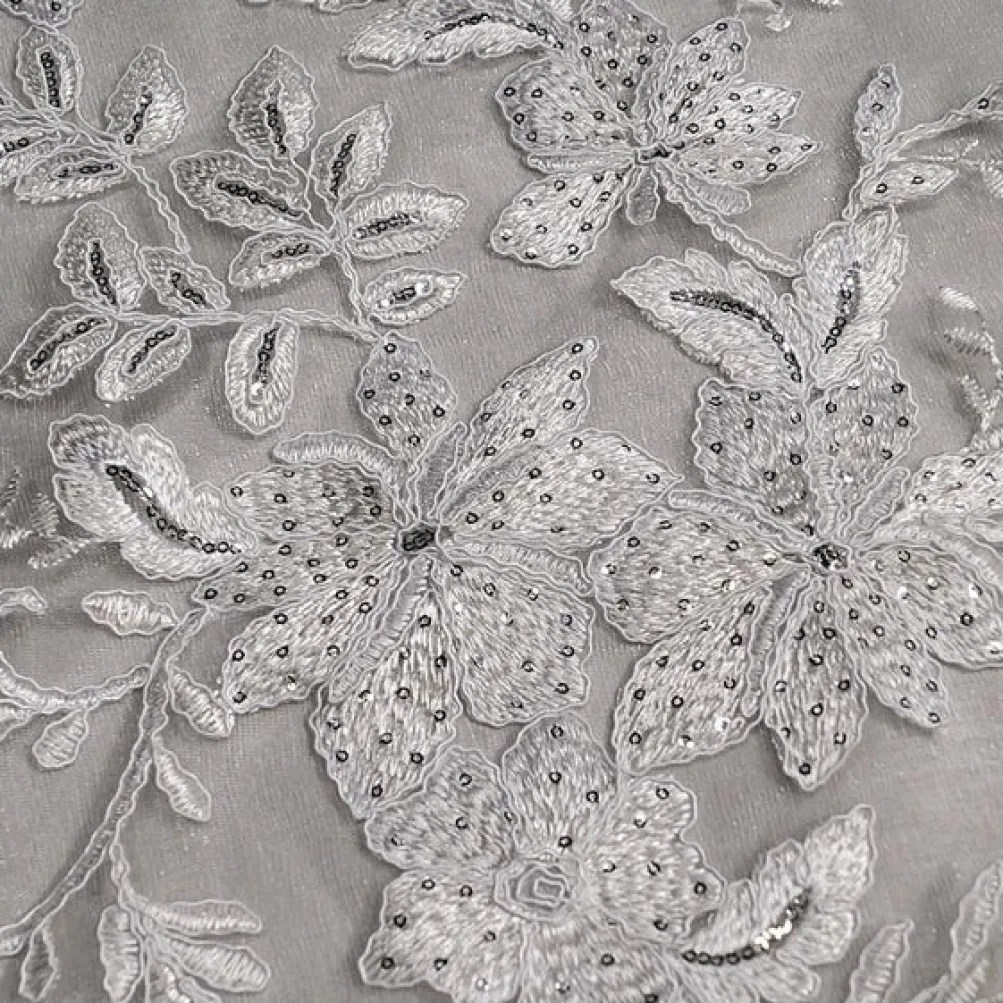 Claire Lace Table Linen in Silver and White