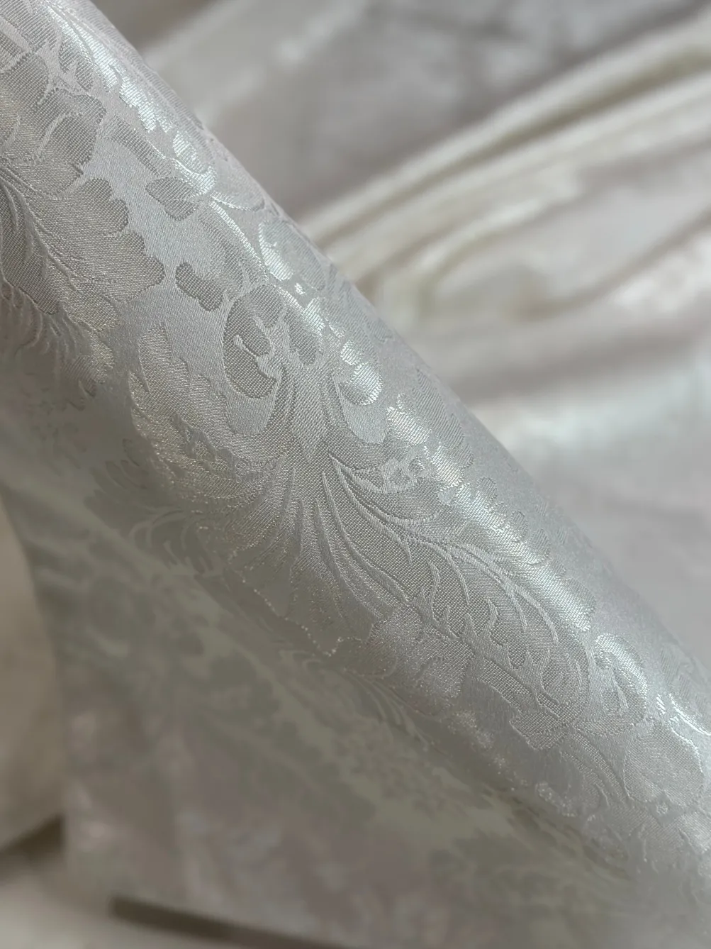 Damask Poly Table Linen in Ivory