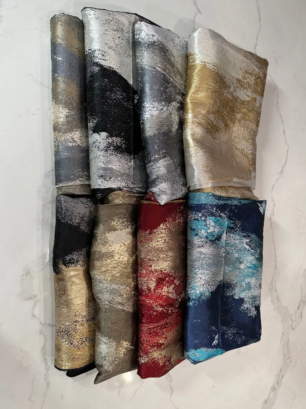 Element Jacquard Table Linen in Black and Gold