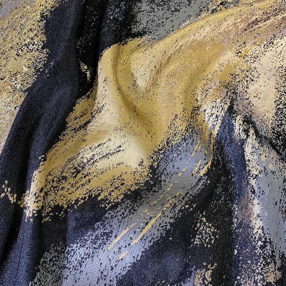 Element Jacquard Table Linen in Black and Gold