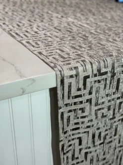 Gio Jacquard Table Linen in Taupe