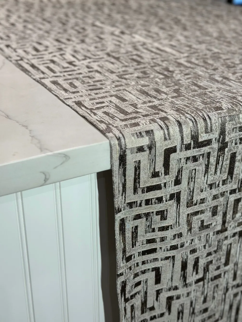 Gio Jacquard Table Linen in Taupe