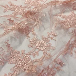 Laylani Lace Table Linen in Coral