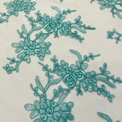 Laylani Lace Table Linen in Teal Green