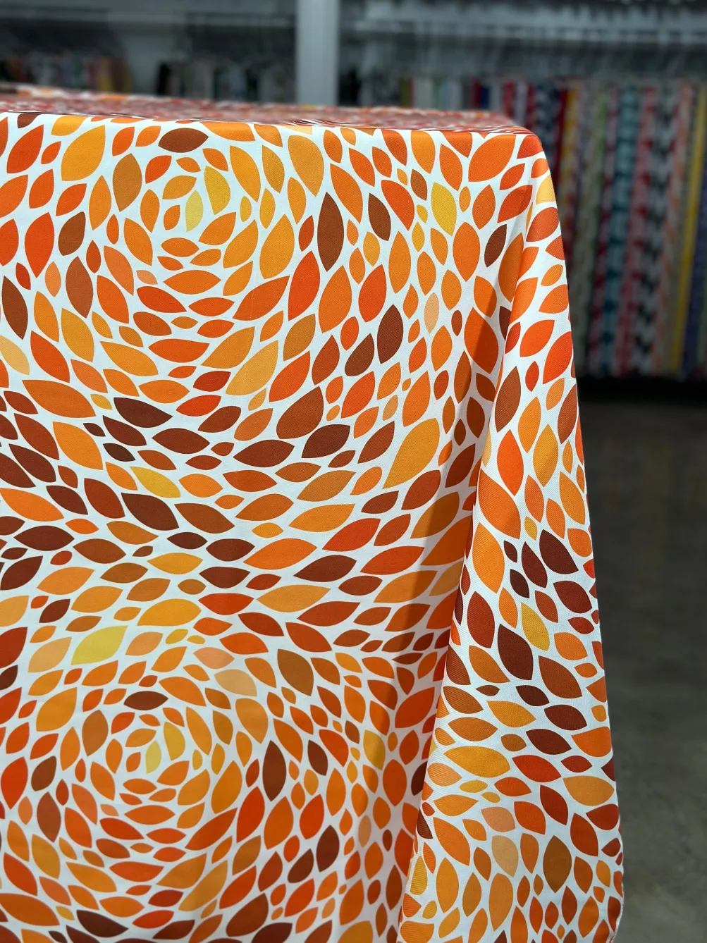 Locus Leaf (Poly Print) Table Linen in Orange