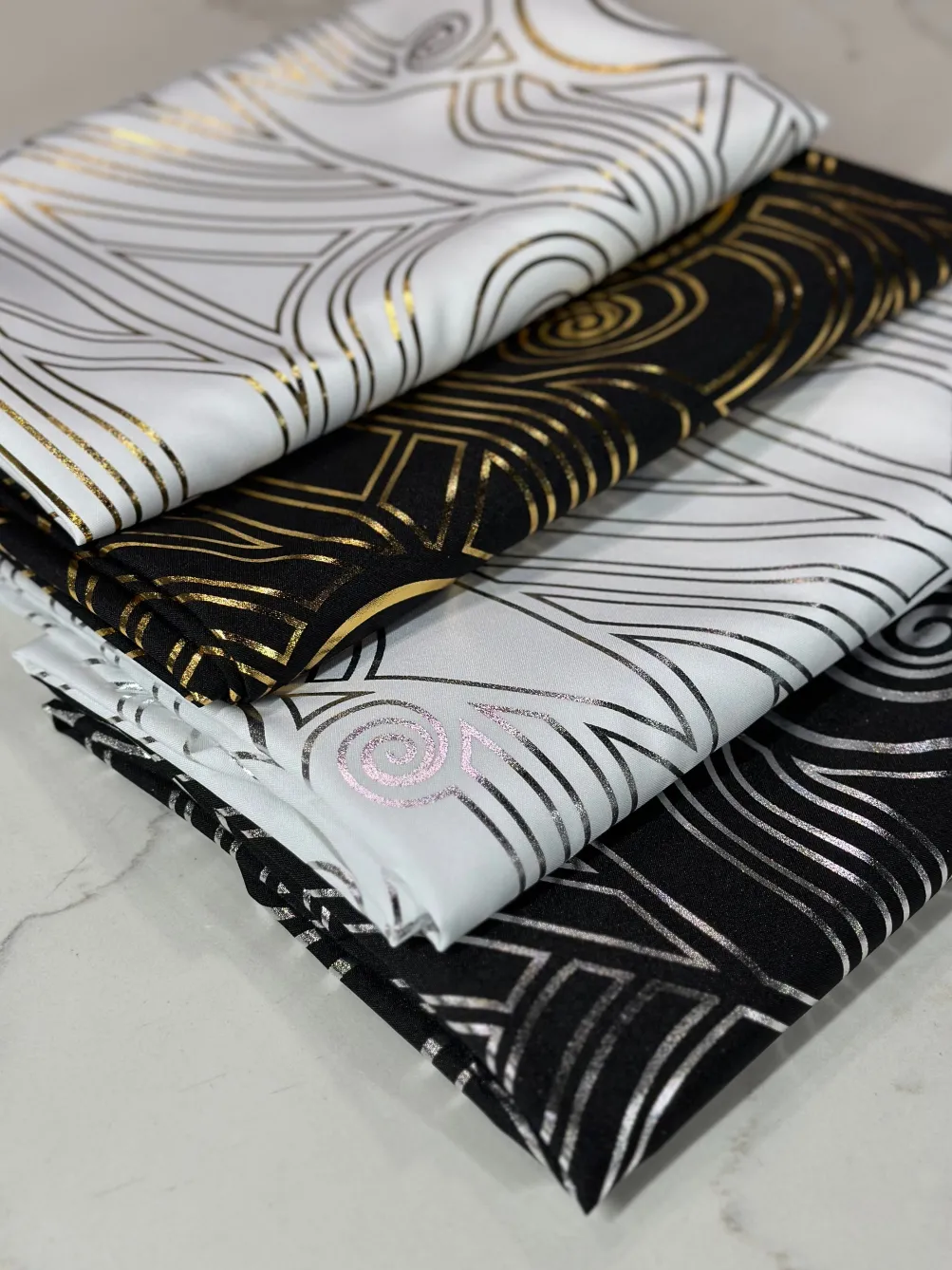 Luxor (Metallic Print) Table Linen in White and Gold
