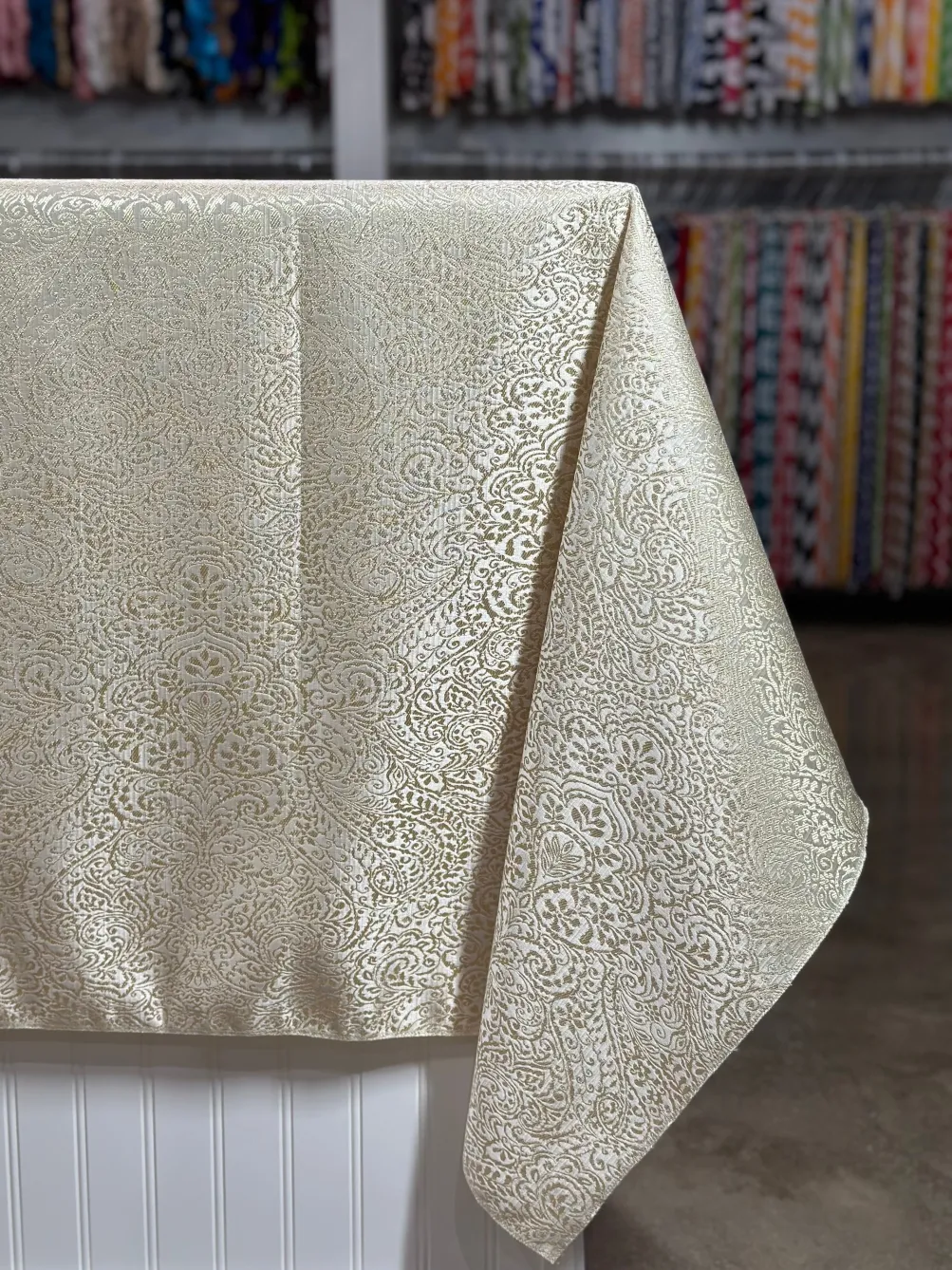 Miramar Jacquard Table Linen in Ivory and Gold