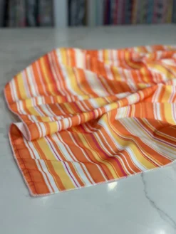 Multi-Color Stripe Table Linen in Sunset