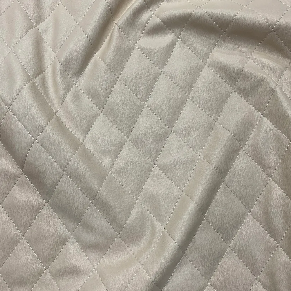 Murano Quilt Table Linen in Taupe