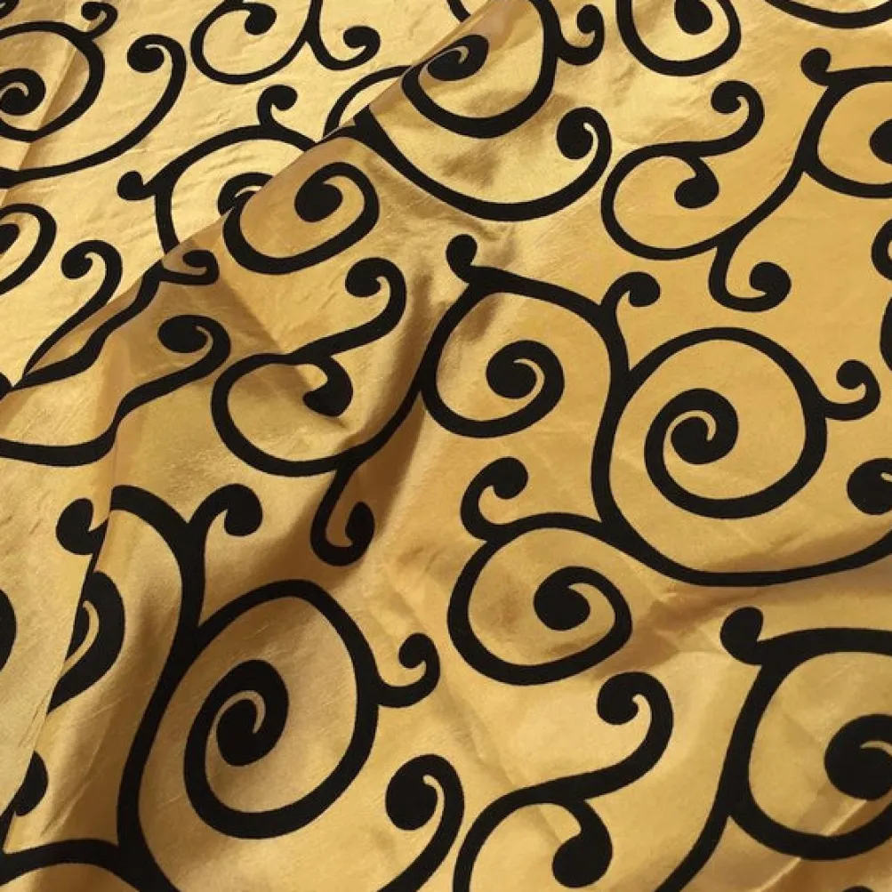 Swirl Flocking Taffeta Table Linen in Black on Gold