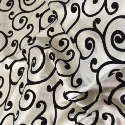 Swirl Flocking Taffeta Table Linen in Black on Ivory