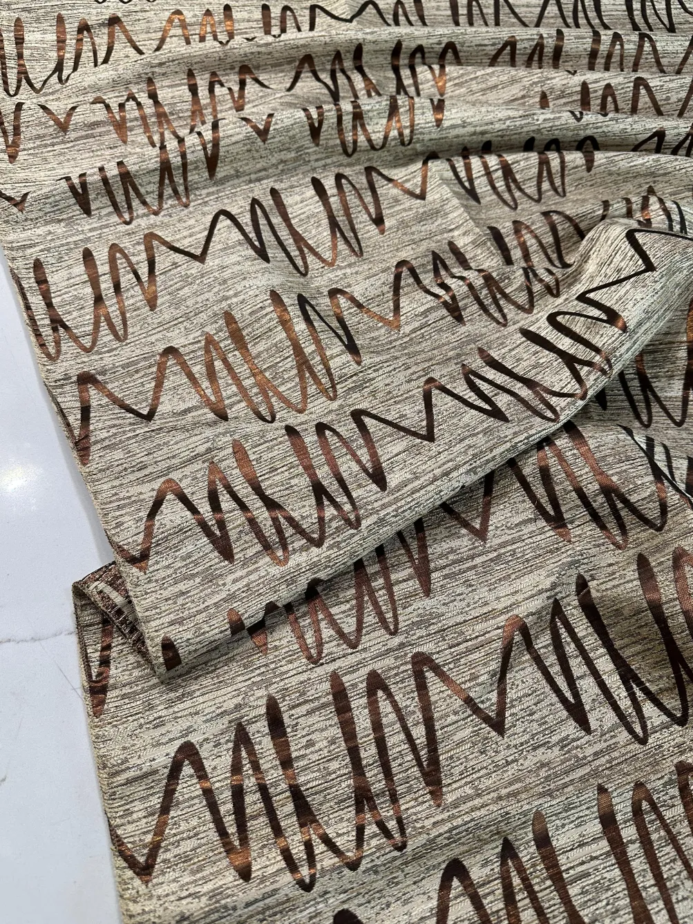 Zion Jacquard Table Linen in Copper