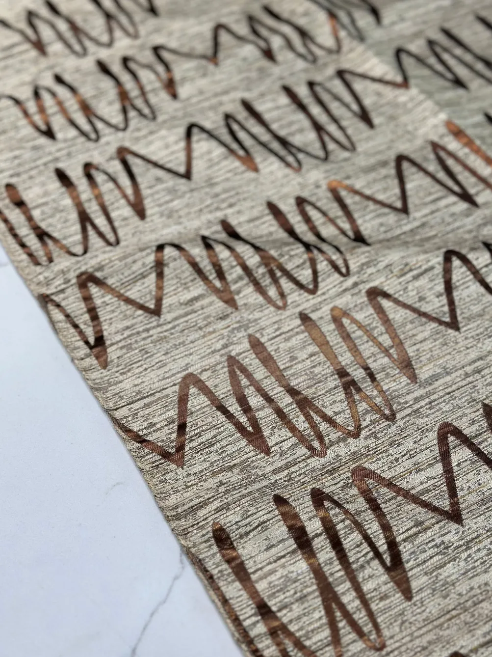 Zion Jacquard Table Linen in Copper